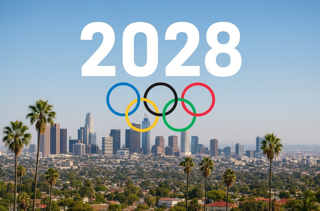 「2028年ロサンゼルス五輪に向けて活気づくLAダウンタウンのスカイライン。パームツリーと都市景観が広がり、カリフォルニア進出やビジネスチャンスを象徴する風景」